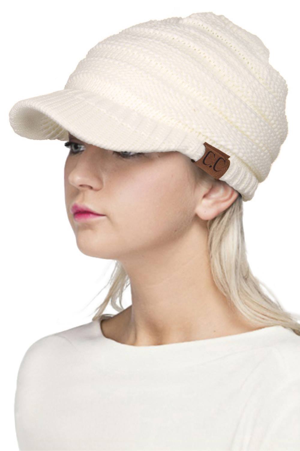 Ivory The C.C Ribbed Knit Brim Beanie delivers understated sophistication with its expertly crafted construction. Engineered from 100% soft acrylic, this exclusive design offers exceptional warmth without weight, making it an ideal choice for layering through transitional seasons. The distinctive ribbed knit texture provides visual interest while the structured brim adds a refined silhouette that complements various face shapes. One size fits most ensures accessibility, while the premium acrylic blend resis