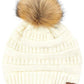 Ivory Stay warm and cozy with this classic C.C Pom Pom Knit Beanie, crafted from 100% soft acrylic for all-day comfort. The ribbed knit design adds texture and durability, while the signature pom pom on top brings a playful touch to any winter outfit. One size fits most, making it the perfect accessory for everyone. Ideal for cold weather adventures or casual everyday wear.
