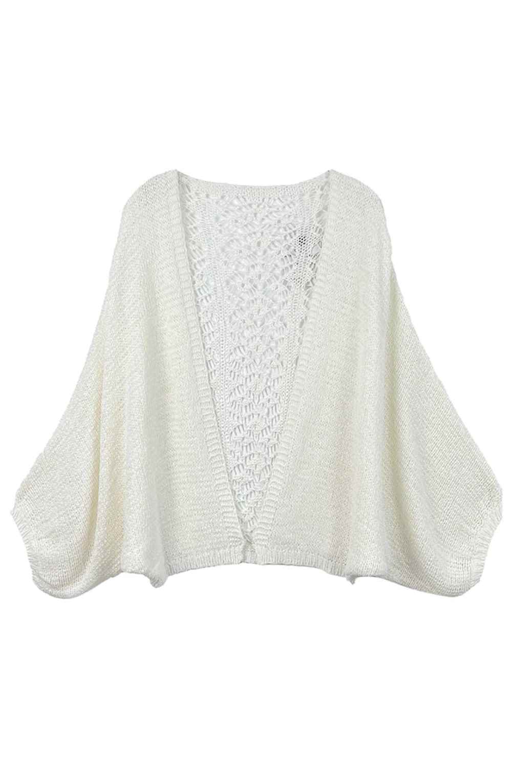 Ivory Effortless elegance meets cozy comfort with this Lace Back Crochet Cardigan. Crafted from a breathable blend of 60% acrylic and 40% nylon, this piece features delicate crochet detailing on the front paired with an eye-catching lace back panel. The relaxed fit measures 23.2" x 45.3", making it perfect for layering over your favorite tops. A versatile wardrobe essential that transitions seamlessly from casual days to evening outings.