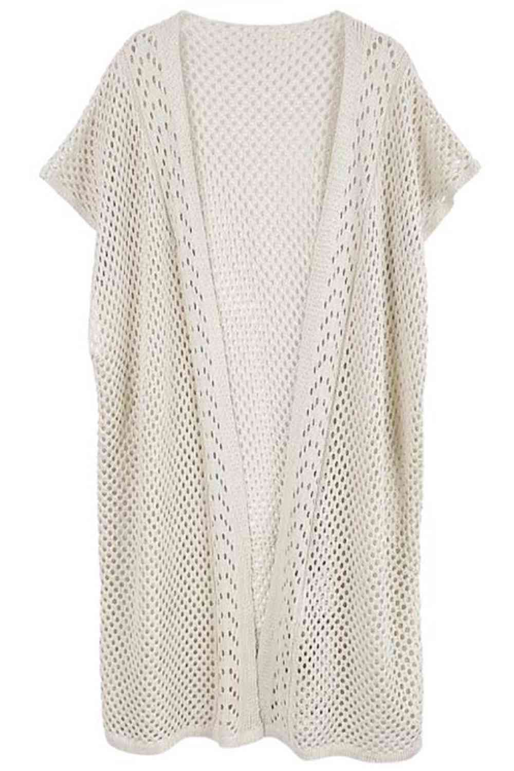 Ivory Effortless elegance meets modern comfort with this Mesh Solid Kimono. Crafted from lightweight 100% polyester, this versatile piece features a breathable mesh construction perfect for layering or wearing solo. With generous dimensions of 38.6" x 27.6", it drapes beautifully over any outfit, adding instant sophistication to casual or dressed-up looks. The solid design ensures easy pairing with your existing wardrobe.