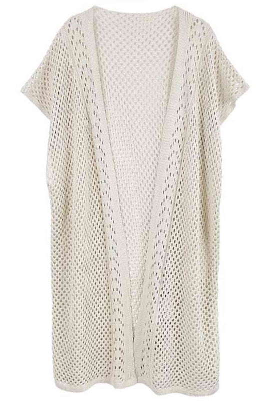Ivory Effortless elegance meets modern comfort with this Mesh Solid Kimono. Crafted from lightweight 100% polyester, this versatile piece features a breathable mesh construction perfect for layering or wearing solo. With generous dimensions of 38.6" x 27.6", it drapes beautifully over any outfit, adding instant sophistication to casual or dressed-up looks. The solid design ensures easy pairing with your existing wardrobe.