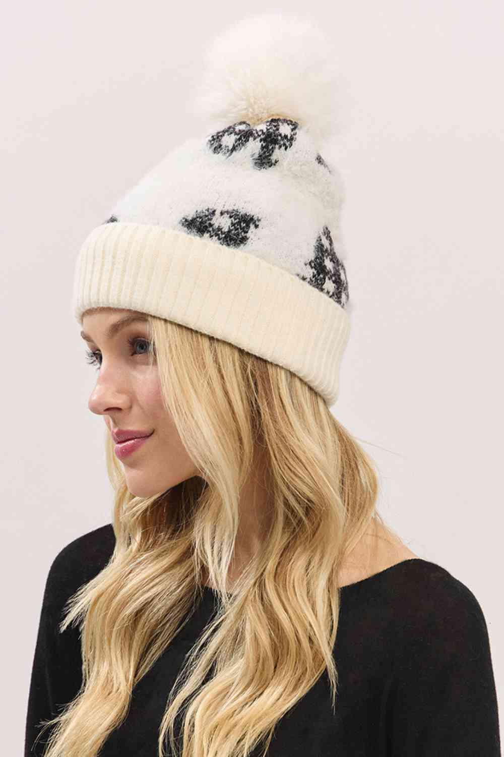 Ivory Plaid Pattern Fur Mixed Fleeced Pom Beanie Hat blends cozy fleece with soft faux-fur accents and a classic plaid design for a warm, stylish winter look. Finished with a plush pom and comfortable stretch fit, it keeps you snug while adding seasonal charm to any cold-weather outfit.