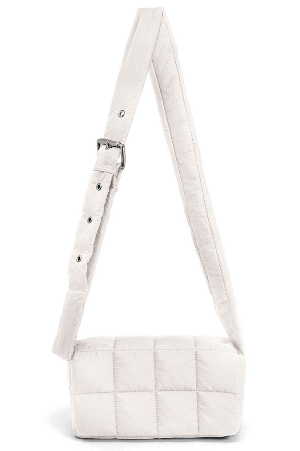 Ivory Compact quilted puffer crossbody bag with a sleek, modern design. Measures 8.7" x 4.7" with a 2.4" depth, perfect for carrying essentials while keeping your hands free. The padded construction offers durability and a soft touch. Ideal for everyday outings, travel, or casual errands.