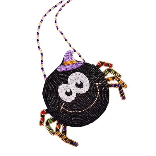 Halloween Spider Beaded Mini Crossbody Bag Effortlessly accessorize your Halloween costume with our beautifully handcrafted Crossbody Bag. Made with intricate beadwork and a convenient crossbody design, this bag adds a touch of spooky elegance to any outfit. Perfect for storing your essentials while trick-or-treating.