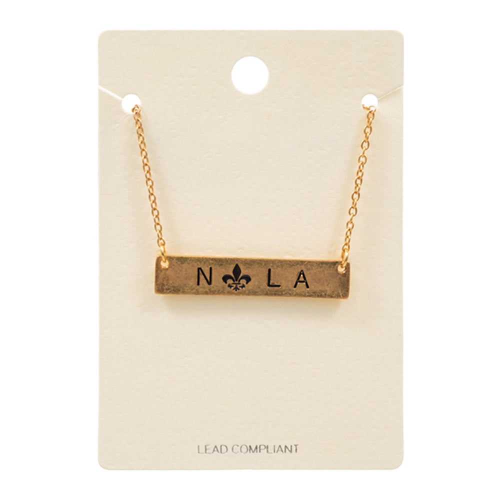 Jet Black Mardi Gras Fleur de Lis Pointed Nola Message Pendant Necklace, is perfect for Mardi Gras events. Made from durable material, this necklace features a colorful Fleur de Lis pendant with a Nola message. Show off your festive spirit in style with this eye-catching necklace. A perfect festive gift for family and friends.