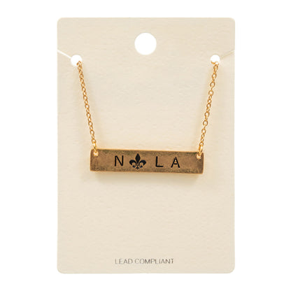 Jet Black Mardi Gras Fleur de Lis Pointed Nola Message Pendant Necklace, is perfect for Mardi Gras events. Made from durable material, this necklace features a colorful Fleur de Lis pendant with a Nola message. Show off your festive spirit in style with this eye-catching necklace. A perfect festive gift for family and friends.