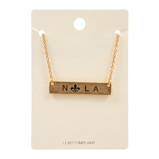 Jet Black Mardi Gras Fleur de Lis Pointed Nola Message Pendant Necklace, is perfect for Mardi Gras events. Made from durable material, this necklace features a colorful Fleur de Lis pendant with a Nola message. Show off your festive spirit in style with this eye-catching necklace. A perfect festive gift for family and friends.