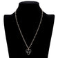Jet Black Smile Pointed Enamel Heart Pendant Necklace is expertly crafted to showcase its unique design. The pointed enamel heart adds a playful touch to any outfit. Made with high-quality materials, this necklace is durable and will remain a timeless piece in your jewellery collection.