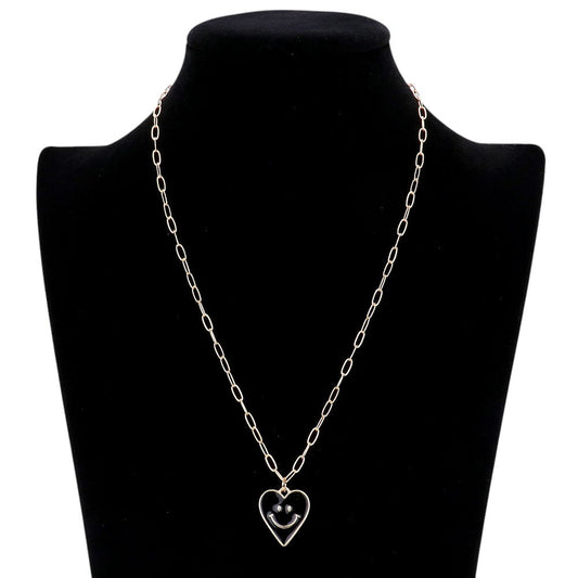 Jet Black Smile Pointed Enamel Heart Pendant Necklace is expertly crafted to showcase its unique design. The pointed enamel heart adds a playful touch to any outfit. Made with high-quality materials, this necklace is durable and will remain a timeless piece in your jewellery collection.