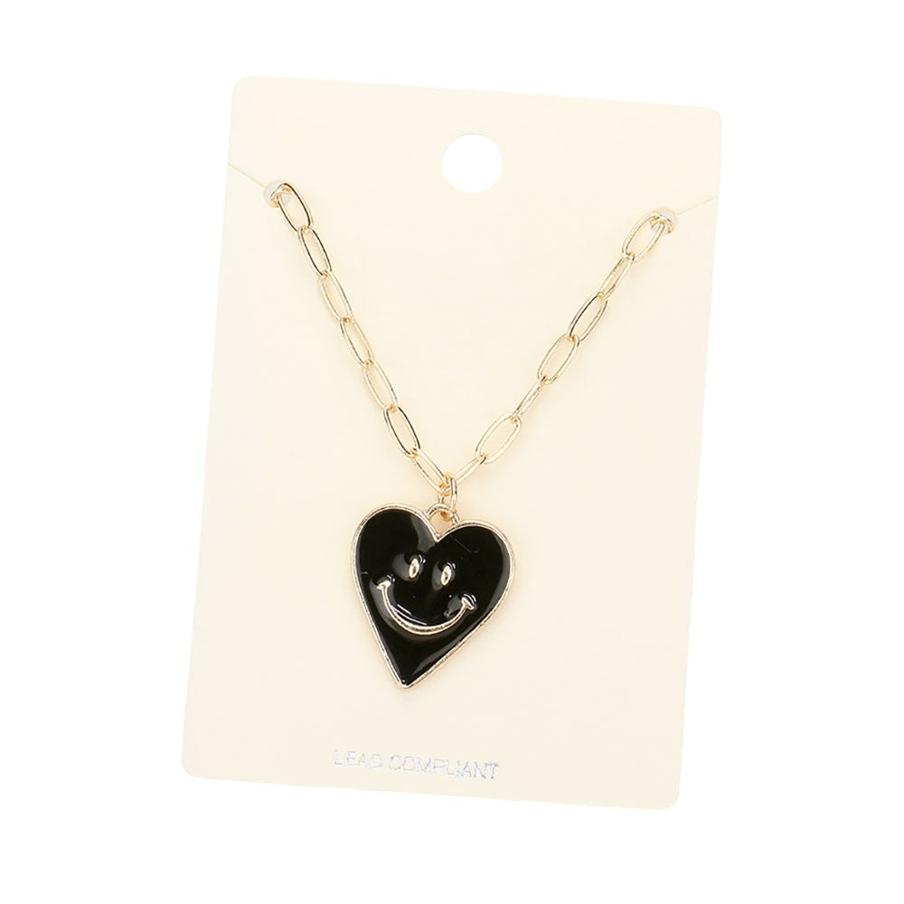 Jet Black Smile Pointed Enamel Heart Pendant Necklace is expertly crafted to showcase its unique design. The pointed enamel heart adds a playful touch to any outfit. Made with high-quality materials, this necklace is durable and will remain a timeless piece in your jewellery collection.
