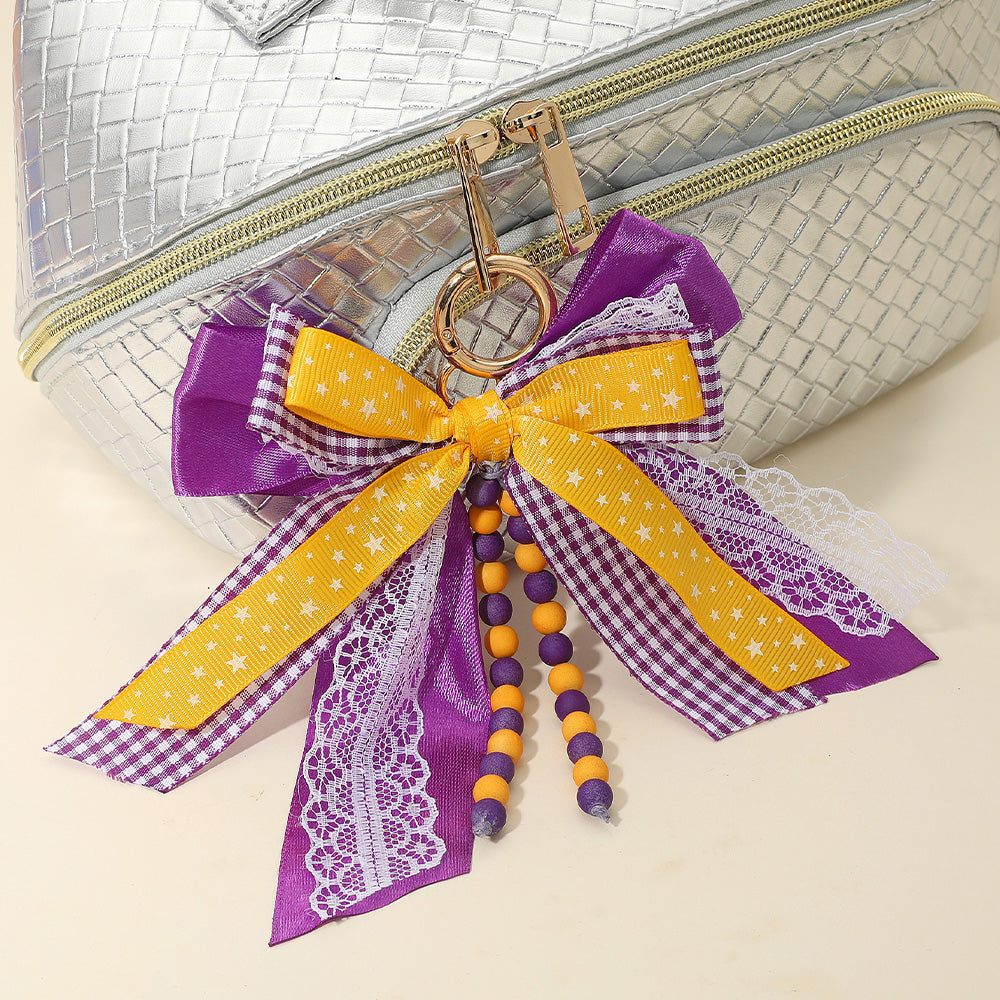 Madeline Love Purple , Yellow Game Day Theme Triple Layered Bow Bag Charm Keychain Bag Charm - Bags & Wallets
