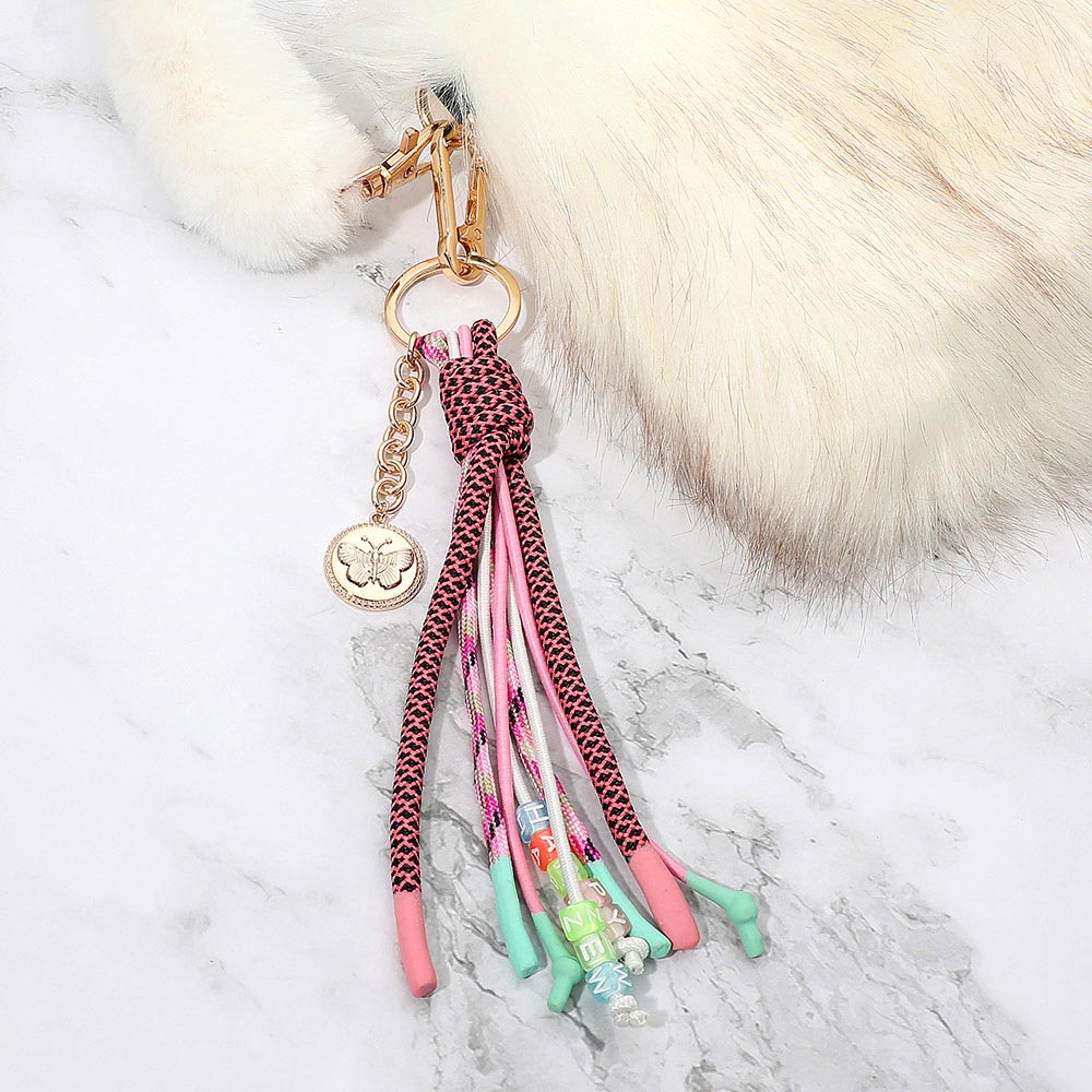 Madeline Love Gold, Multi Butterfly Embossed Coin Drop HAPPY ZEW Message Beaded Rope Tassel Keychain Bag Charm - Bags & Wallets