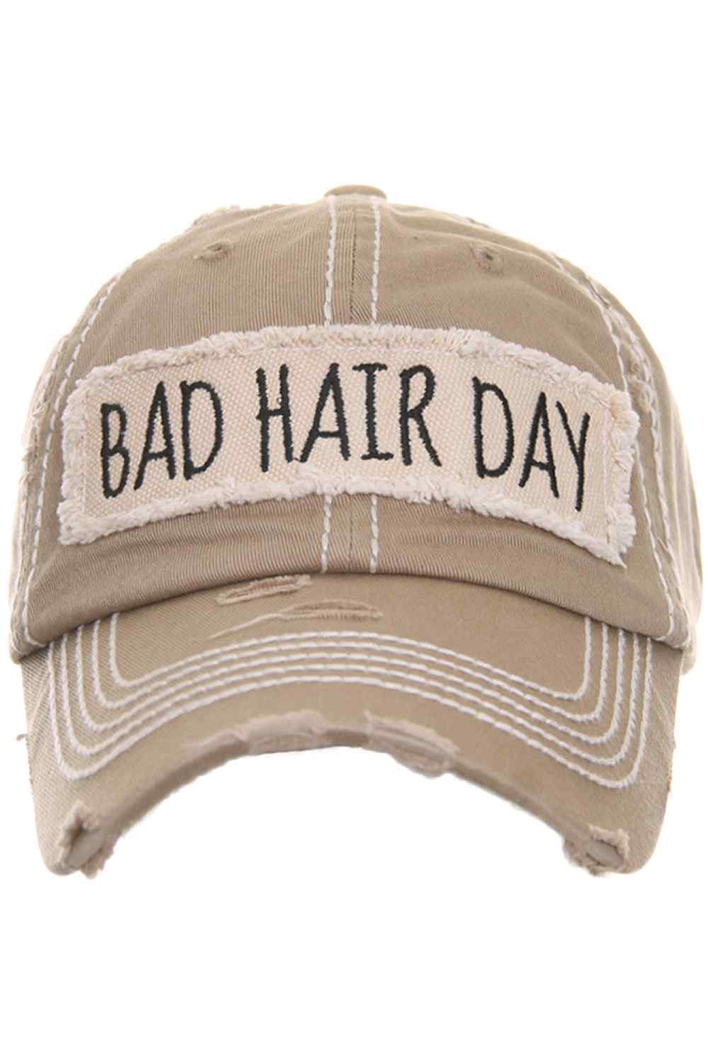 Khaki Keep it casual and playful with the BAD HAIR DAY Washed Vintage Baseball Cap, featuring a relaxed, worn-in style that adds personality to any outfit. Designed with a classic curved brim and comfortable fit, it’s the perfect go-to accessory for effortless everyday wear.