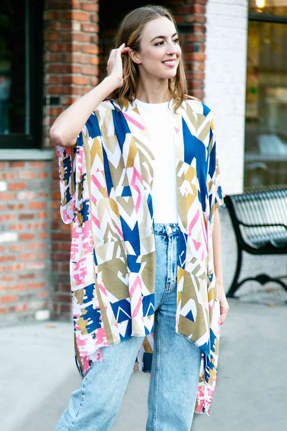 Khaki Elevate your beach wardrobe with this stunning geometric abstract kimono cover up. Made from breathable 100% viscose, it's the perfect lightweight layer for sun-soaked days. The eye catching abstract pattern brings contemporary flair to any swimwear ensemble. With generous dimensions of 38" x 39", this cover up offers comfortable coverage and an easy, relaxed silhouette. Ideal for transitioning from beach to brunch in effortless style.