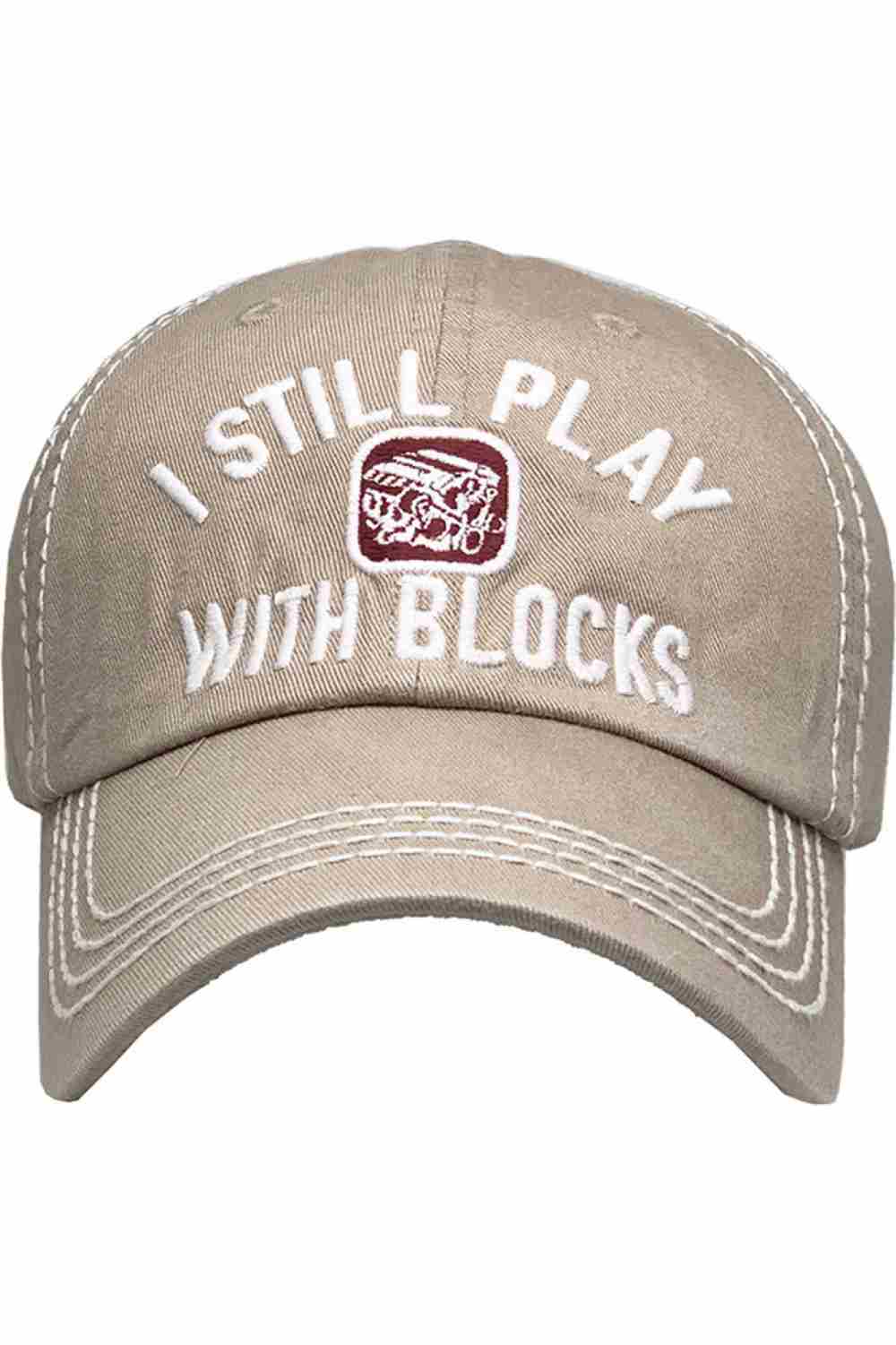 Khaki Show off your playful side with the I Still Play Blocks Vintage Baseball Cap, featuring a distressed finish and classic curved brim for effortless everyday style. Made from soft, breathable cotton with an adjustable back strap, this cap offers a comfortable fit while adding a fun retro touch to any casual outfit.