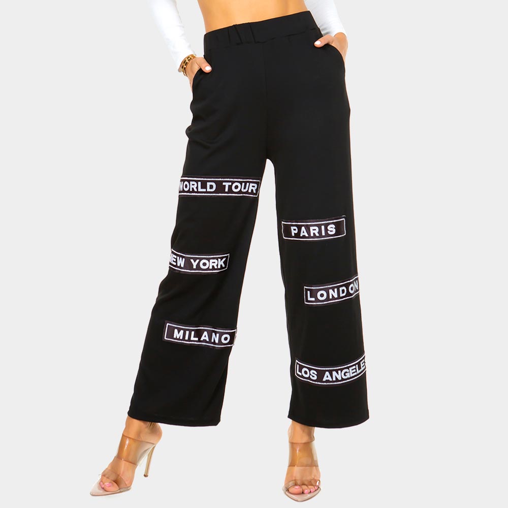 Madeline Love Black City Name Printed Pants - Apparel