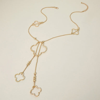 Madeline Love Gold Hammered Metal Open Quatrefoil Long Necklace - Necklaces