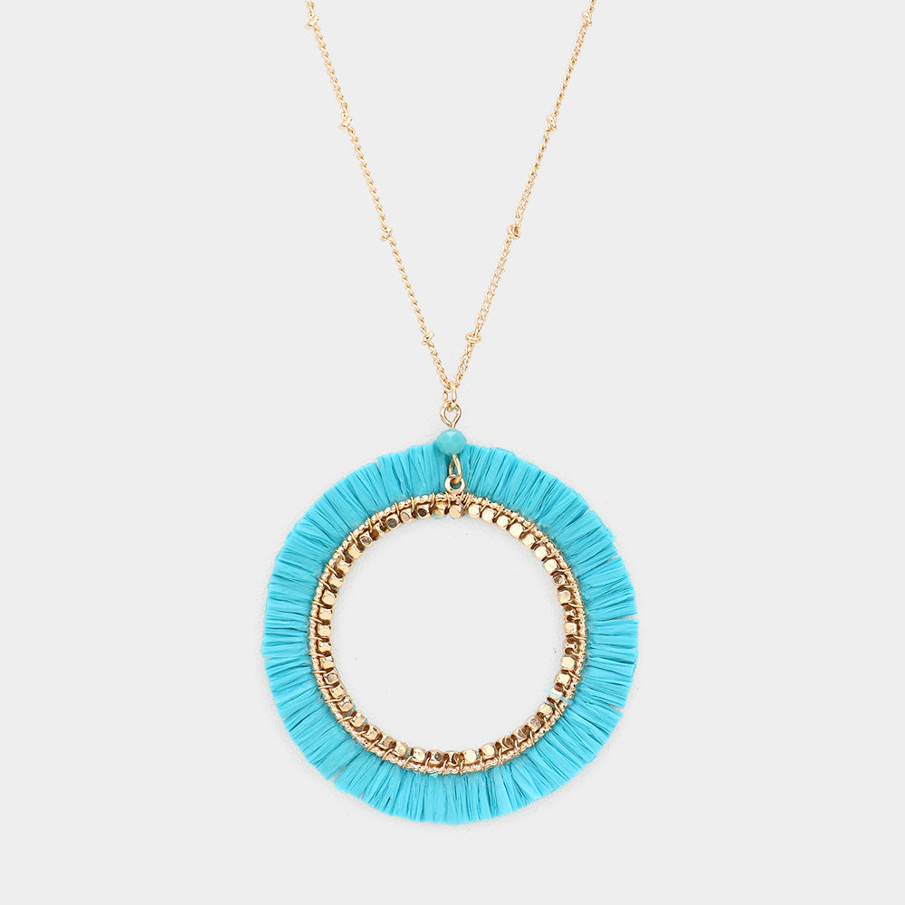Madeline Love Turquoise Raffia Trimmed Open Circle Pendant Long Necklace - Necklaces