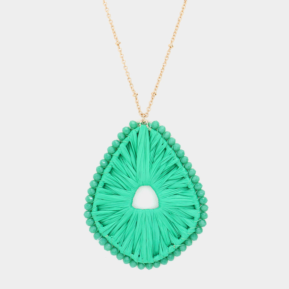Madeline Love Green Faceted Bead Trimmed Woven Raffia Pendant Long Necklace - Necklaces