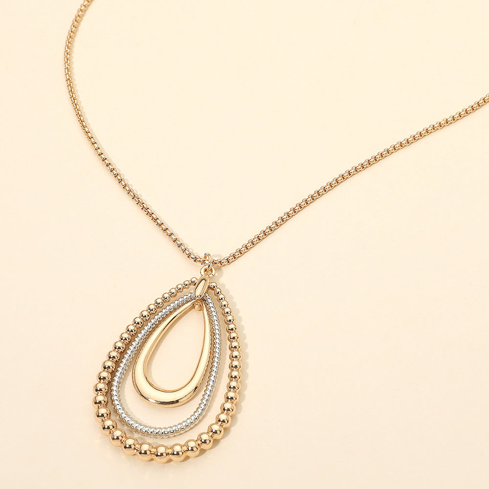 Madeline Love Gold, Two Tone Metal Bubble Layered Teardrop Pendant Long Necklace - Necklaces