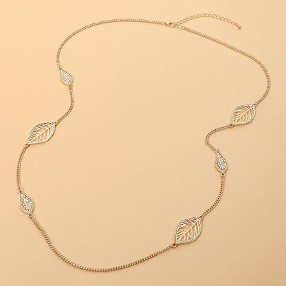 Madeline Love Gold Openwork Metal Leaf Station Long Necklace