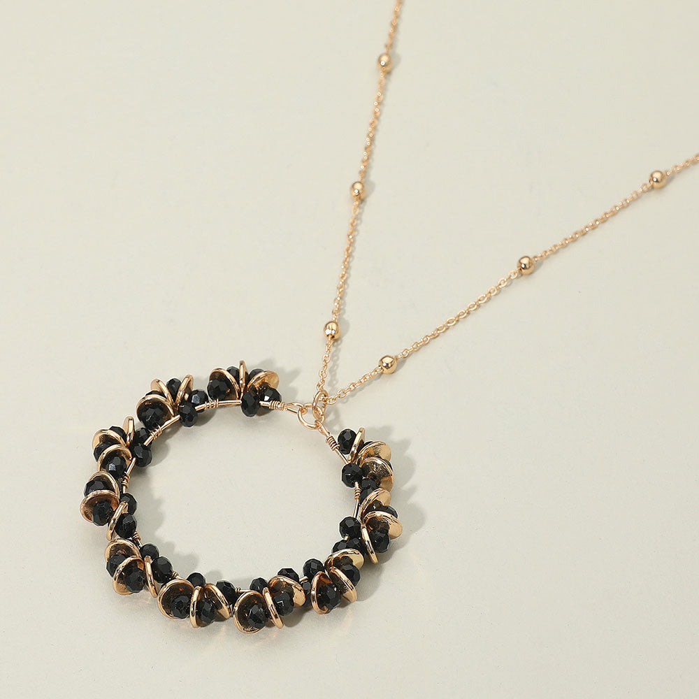 Madeline Love Black Metal Disc Faceted Beaded Open Ring Pendant Long Necklace - Necklaces