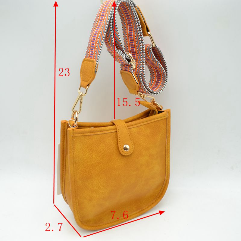 Minimalist Curved Crossbody Bag with Patterned Guitar Strap - Crossbody Bags