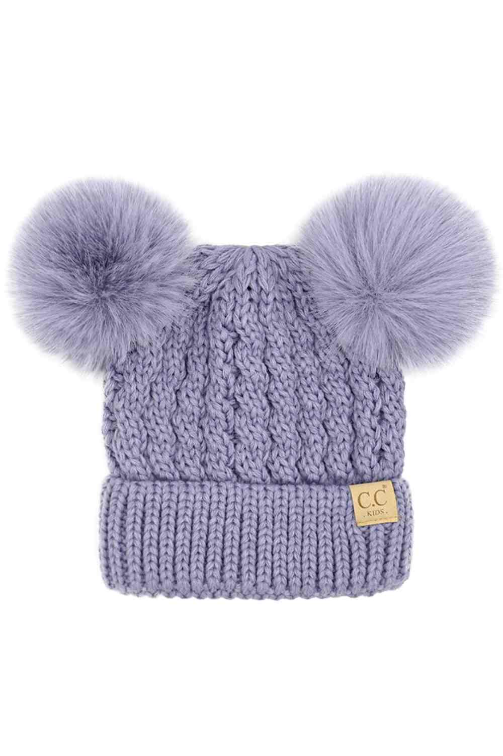 Lavender Keep your child warm and stylish with this C.C Kids Double Pom Pom Beanie, featuring an all-over cable knit pattern. Made from 100% acrylic, it's soft, durable, and easy to care for. The playful double pom poms add a fun touch kids love.