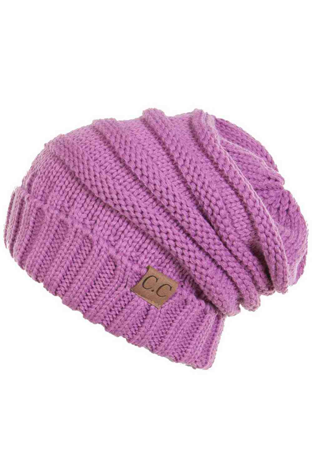 Lavender Wrap yourself in warmth with this C.C Slouchy Knitted Beanie, crafted from 100% soft acrylic for ultimate comfort. The oversized silhouette and plush pom pom detail create a relaxed, on-trend look perfect for chilly days. Available in nine versatile colors—Beige, Berry, Dark Denim, Heather Gray, Ivory, Pistachio, Rose, Steel Blue, and Violet Purple—this beanie pairs effortlessly with any winter wardrobe. The ribbed knit construction ensures durability and a flattering fit. Hand wash and lay flat to