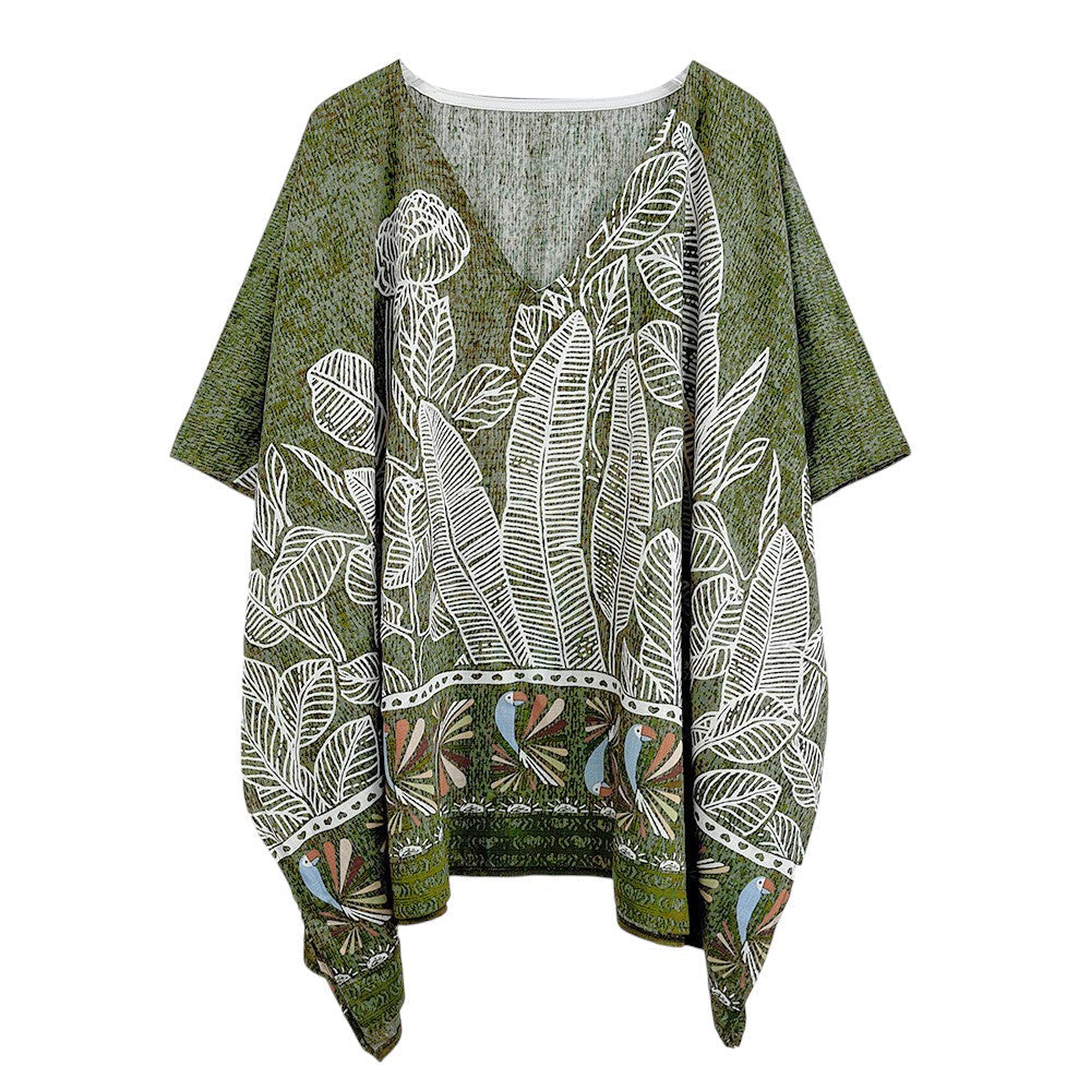 Green Leaf Print Cover Up Poncho is the perfect addition to your summer wardrobe. Made from lightweight fabric, it is both stylish and functional, providing coverage from the sun while keeping you cool. The leaf print adds a touch of nature-inspired elegance to any beach or pool ensemble. 