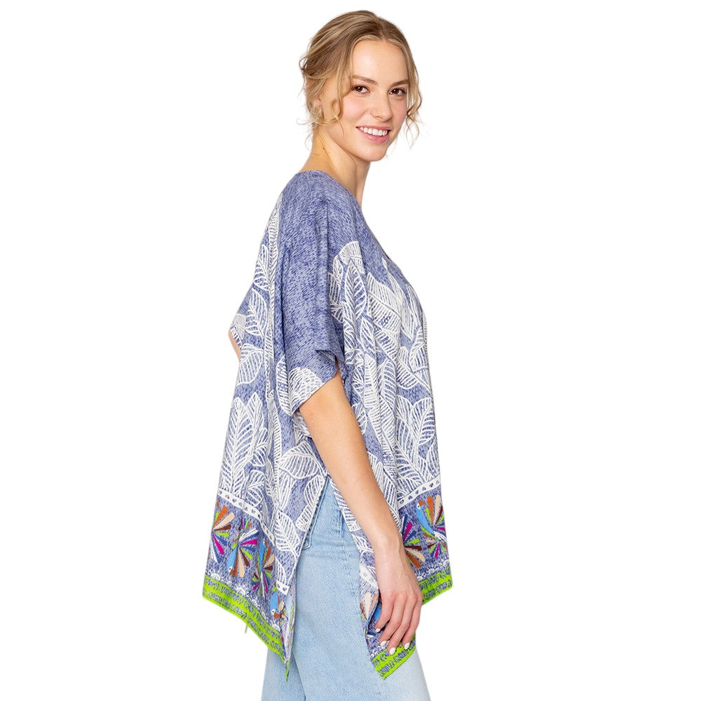 Blue Leaf Print Cover Up Poncho is the perfect addition to your summer wardrobe. Made from lightweight fabric, it is both stylish and functional, providing coverage from the sun while keeping you cool. The leaf print adds a touch of nature-inspired elegance to any beach or pool ensemble. 
