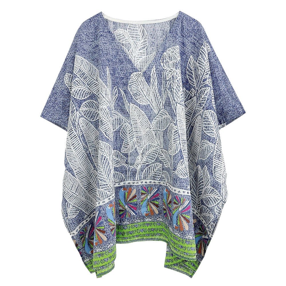 Blue Leaf Print Cover Up Poncho is the perfect addition to your summer wardrobe. Made from lightweight fabric, it is both stylish and functional, providing coverage from the sun while keeping you cool. The leaf print adds a touch of nature-inspired elegance to any beach or pool ensemble. 