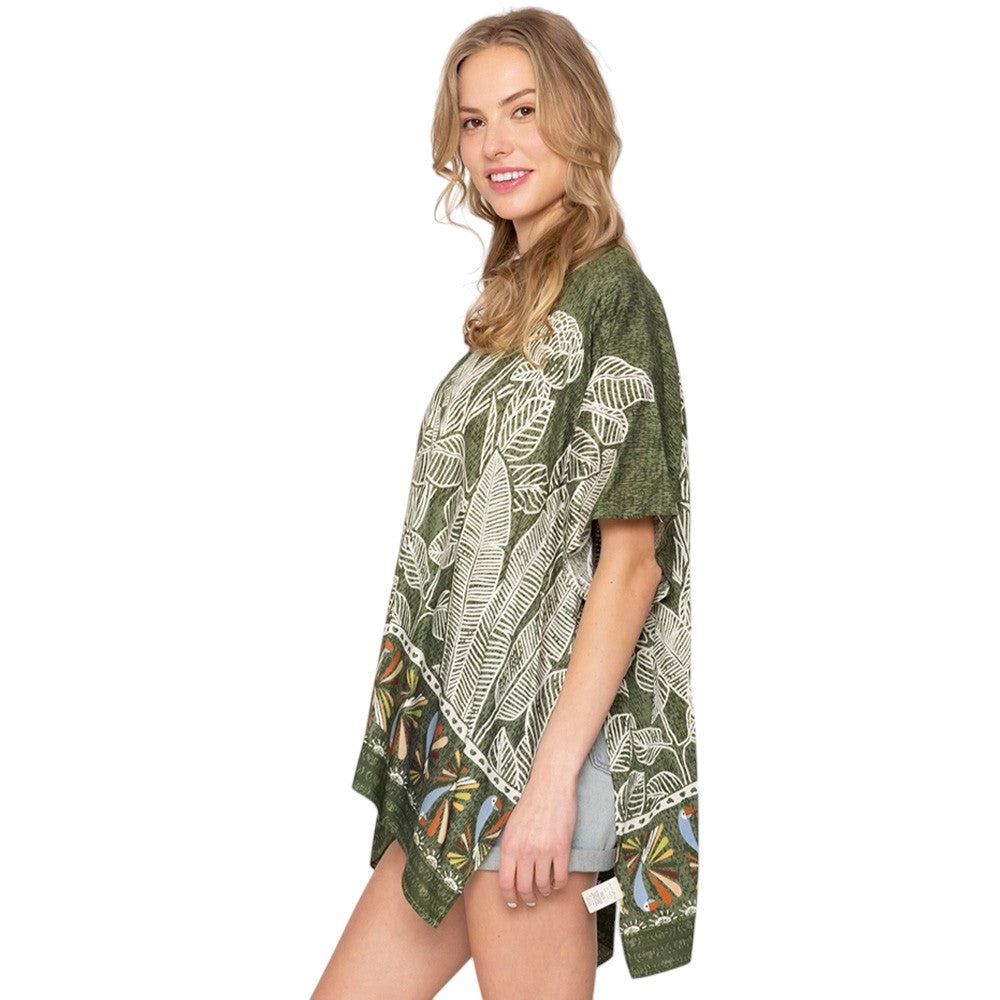 Green Leaf Print Cover Up Poncho is the perfect addition to your summer wardrobe. Made from lightweight fabric, it is both stylish and functional, providing coverage from the sun while keeping you cool. The leaf print adds a touch of nature-inspired elegance to any beach or pool ensemble. 