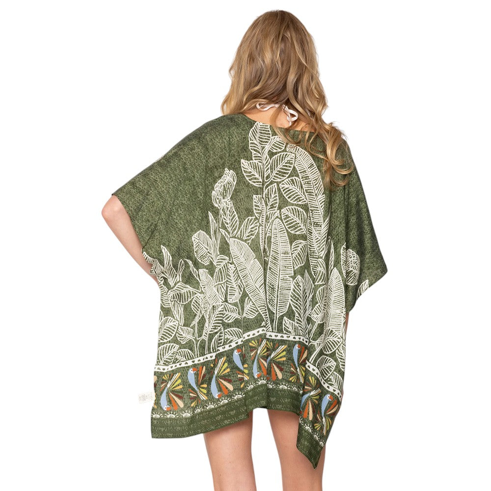 Green Leaf Print Cover Up Poncho is the perfect addition to your summer wardrobe. Made from lightweight fabric, it is both stylish and functional, providing coverage from the sun while keeping you cool. The leaf print adds a touch of nature-inspired elegance to any beach or pool ensemble. 