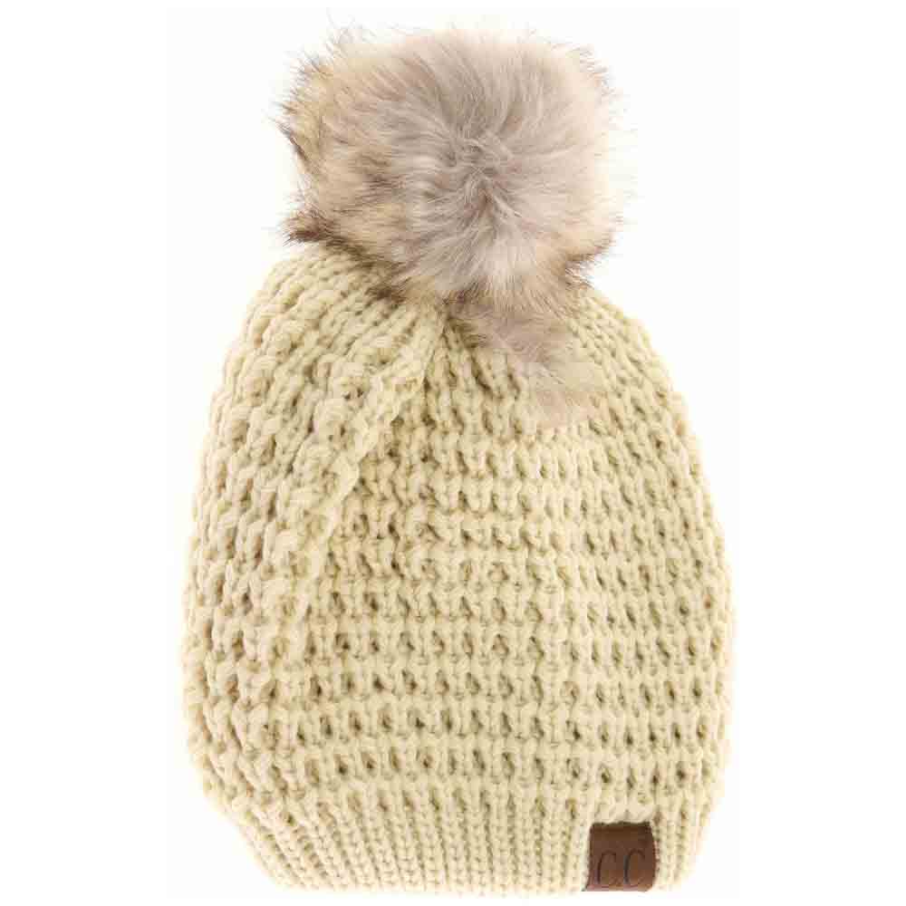 Lemonade Solid Waffle Stitch Fur Pom C.C Beanie combines classic waffle stitch knitting with a plush fur pom for an elevated winter accessory. Crafted for warmth and style, this beanie offers a comfortable fit that retains heat without bulk. Its timeless design makes it a versatile piece, suitable for both casual and refined cold-weather looks. Perfect for those seeking expert-level comfort and fashion in one essential hat. 