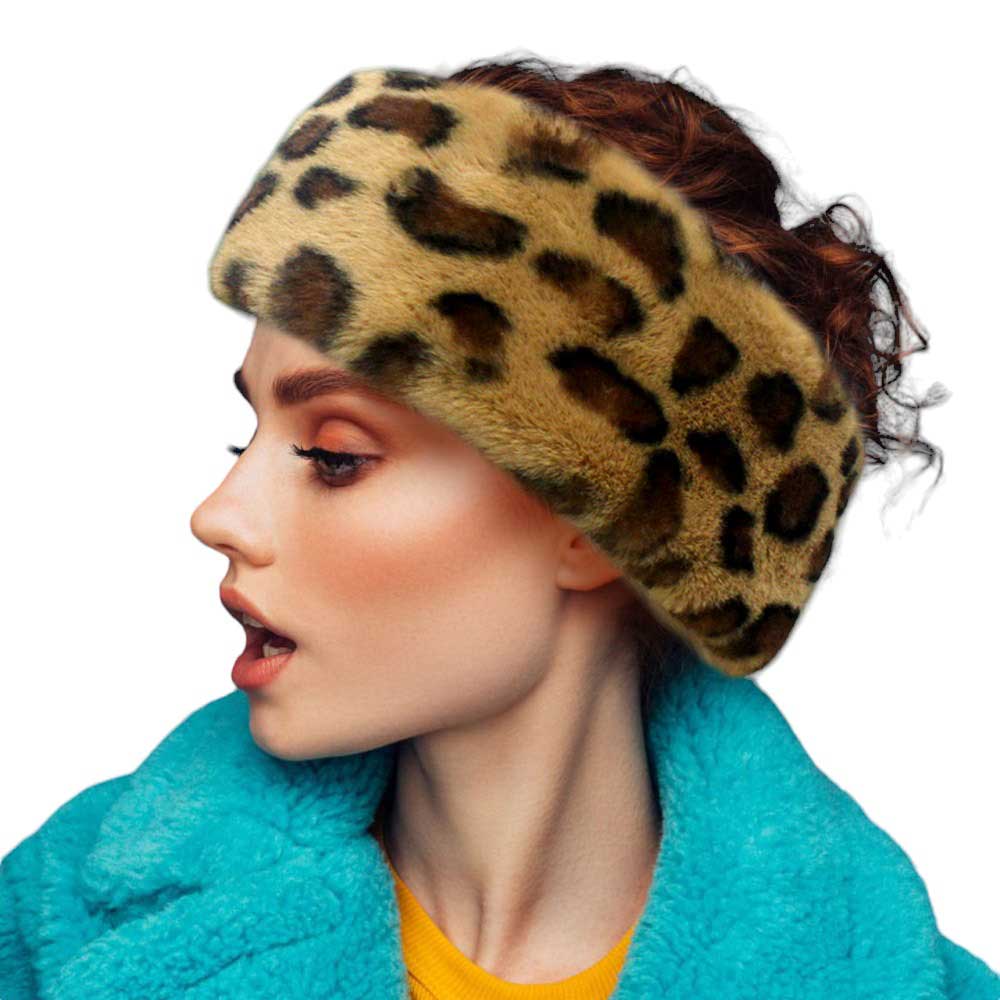 Leopard Faux Fur Earmuff Headband, keeps your ears comfortably warm. The solid construction features luxurious faux fur for an elegant, yet practical look. Stay cozy and stylish during the coldest days of the year. Perfect winter gift for people you care about. 