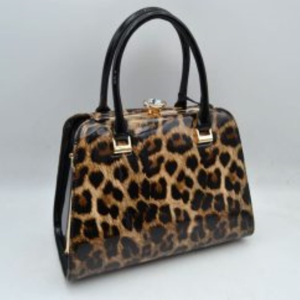 Lopard This sophisticated frame handbag features a high-shine patent finish and a structured trapezoidal silhouette, making it an elegant choice for evening or formal wear. Designed with a classic frame top closure, it is secured by a distinctive pearl-accented gold-tone twist lock. Dual rolled top handles attached via polished metallic hardware allow for stylish handheld carrying, while an included detachable shoulder strap with gold-tone clasps offers versatile hands-free shoulder options.
