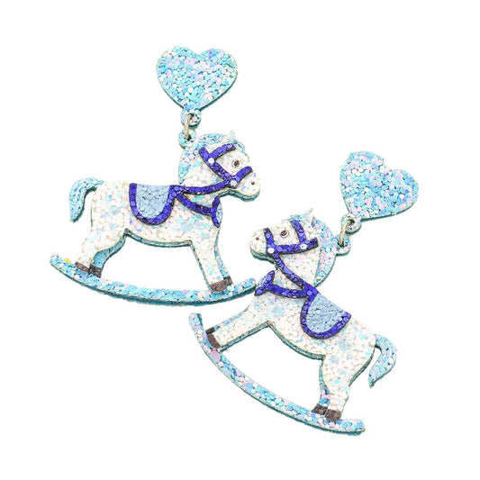 Light Blue Glittered Heart Rocking Horse Link Dangle Earrings will add a unique and artistic twist to any look. The charming design features a heart-shaped rocking horse crafted from glittered metal with a link dangling chain and post-back design that secures day-long wear. Perfect for animal lovers and fashion fans alike. 