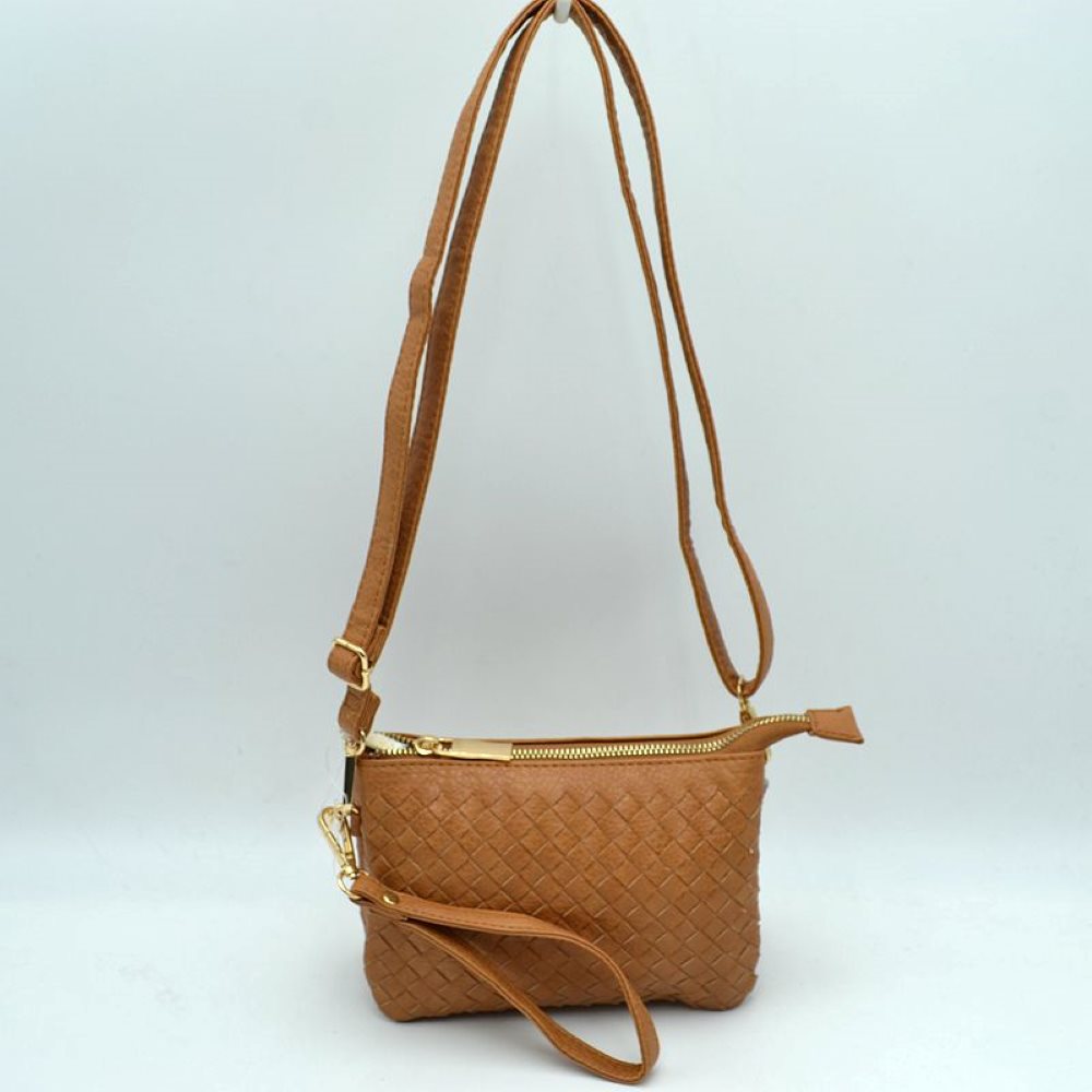 Light Brown Meet your new go-to companion for hands-free convenience and effortless style. Combining a beautifully textured, woven exterior with exceptional organization, this versatile bag transitions perfectly from a casual daytime crossbody to a chic evening wristlet.