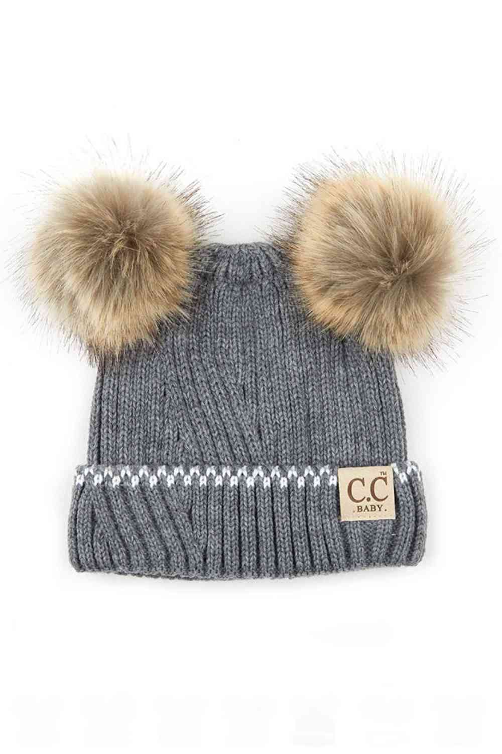 Light Gray Wrap your infant in warmth and style with this C.C Solid Knit Double Pom Beanie. Crafted from 100% acrylic, this soft and durable beanie features a classic ribbed knit construction paired with two adorable poms for extra charm. Perfect for keeping tiny heads cozy during cold weather while adding a playful touch to any outfit.