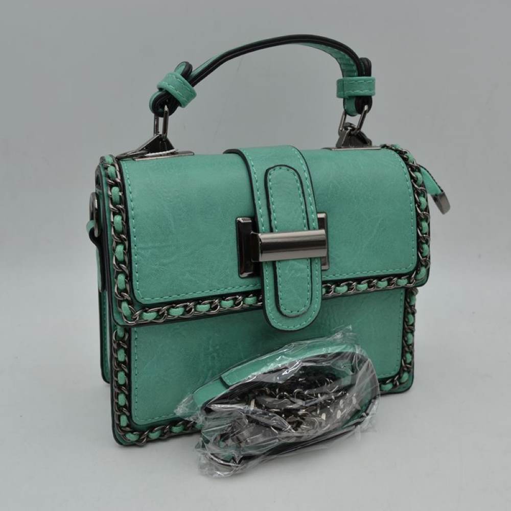 Light Green Add a touch of structured elegance to your look with this chic top-handle satchel bag. Designed for the modern trendsetter, it seamlessly blends classic vintage vibes with contemporary edgy accents.