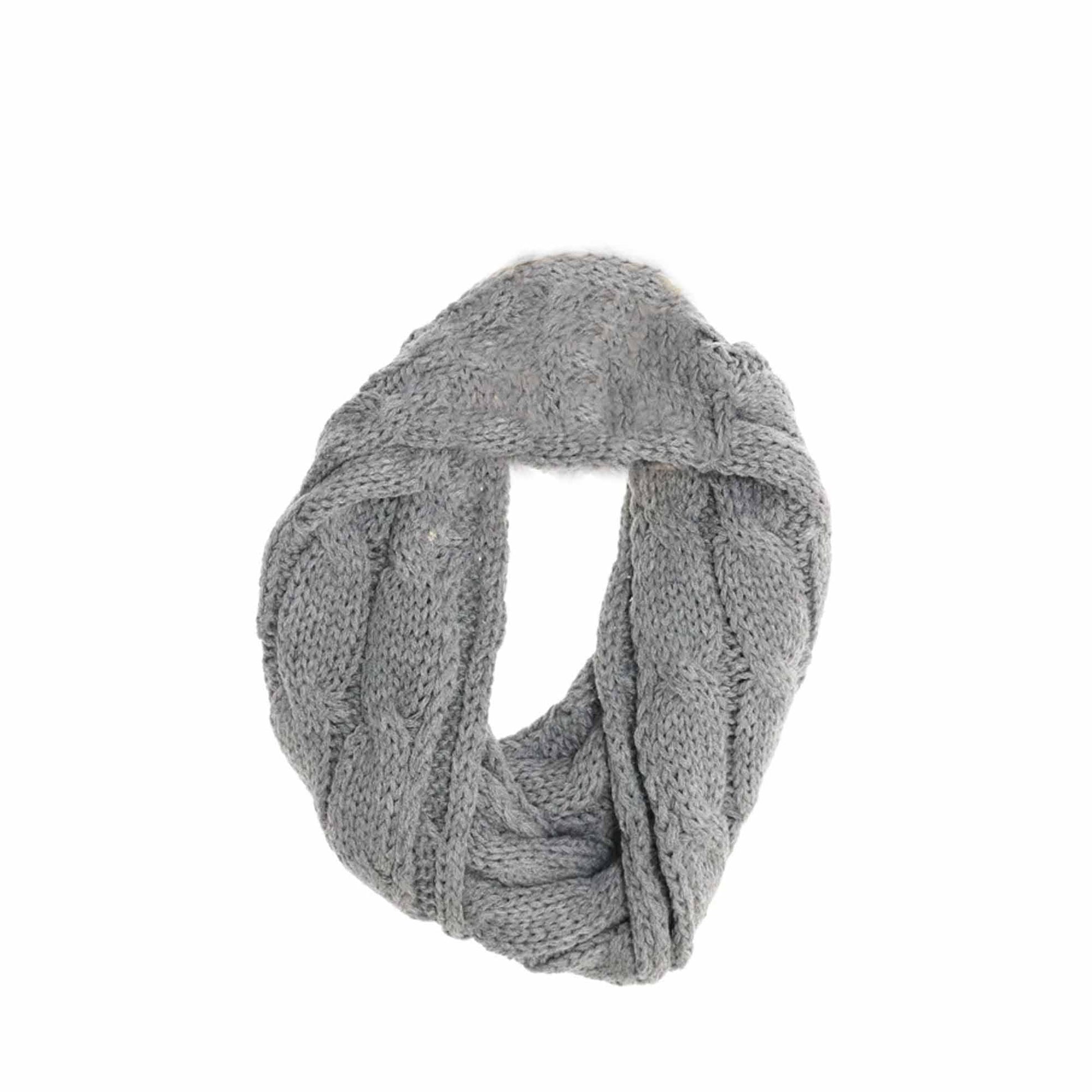 LightGrey KIDS Solid Cable Knit CC Infinity Scarf offers reliable warmth and comfort for young children during chilly days. Its expertly crafted cable knit construction ensures durability and softness, while the infinity design allows for easy, secure wear without the hassle of loose ends. This solid-colored scarf is a practical accessory that complements any kid’s winter wardrobe, providing both functional protection. 