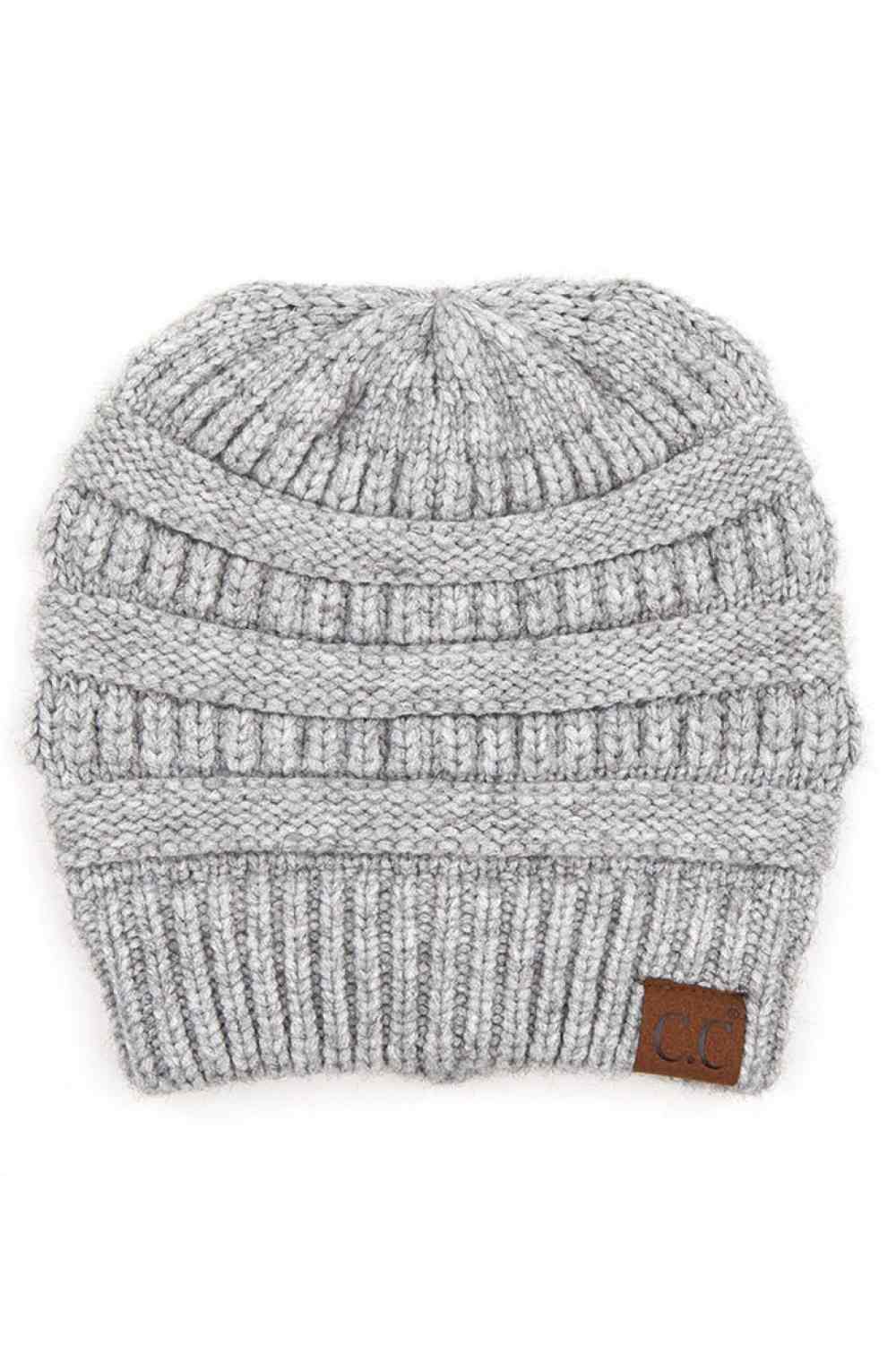 Light Grey Wrap yourself in softness with this C.C Soft Yarn Knit Beanie, crafted from a premium blend of 47% rayon, 31% PBT, and 22% nylon. The luxurious rayon provides a silky feel against your skin, while the durable synthetic fibers ensure lasting wear through winter season.