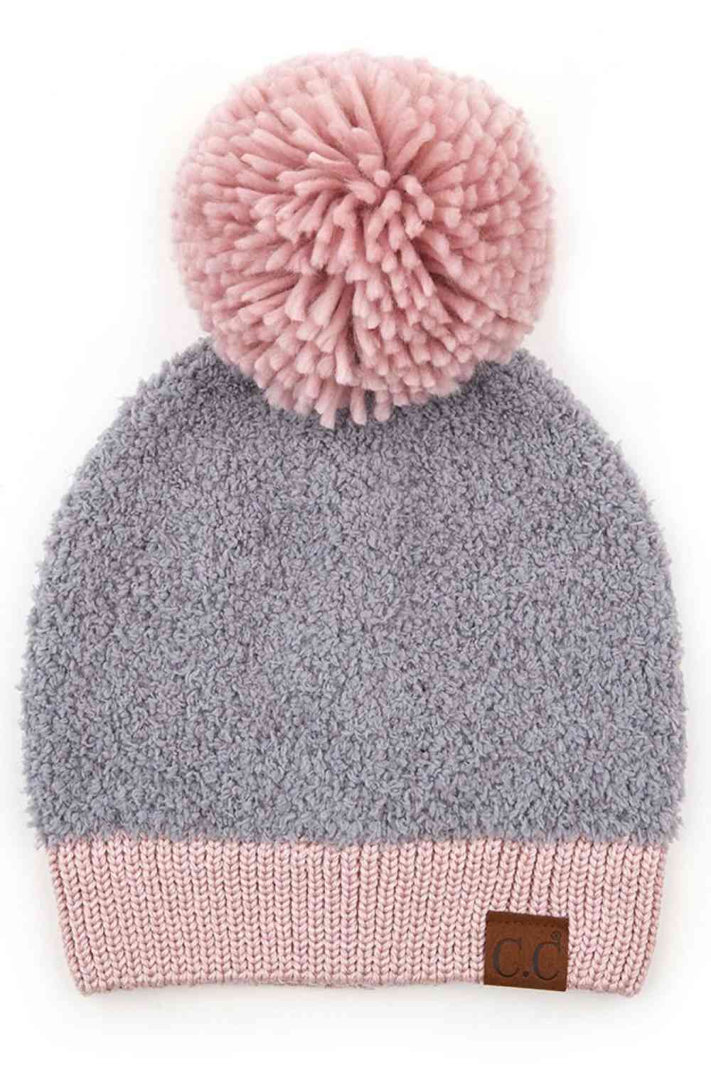 Light Grey Stay warm and stylish with this C.C Knitted Sherpa Beanie, designed with a soft sherpa lining and contrasting color accents. The cozy knit construction combines 50% acrylic and 50% polyester for durability and comfort through chilly seasons.