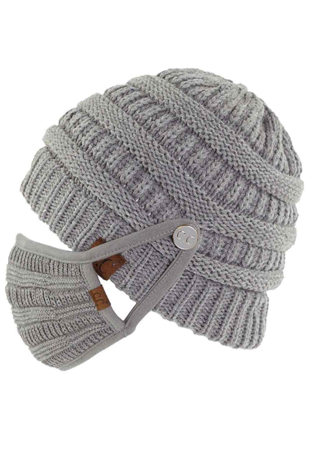 Light Gray Stay warm and functional with this C.C Ribbed Knit Beanie featuring a convenient button attachment for your mask. Crafted from 100% acrylic, this lightweight beanie offers soft comfort and durability for everyday wear.