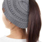 Light Grey The C.C Solid Color Ponytail Messy Bun Beanie combines comfort with versatility for effortless everyday style. Crafted from 100% soft acrylic, this beanie features an open crown design that accommodates ponytails and messy buns while keeping you warm. The one-size-fits-most construction ensures a secure, flattering fit for virtually anyone. Perfect for casual outings, workouts, or relaxed weekends, this practical accessory transitions seamlessly from season to season.