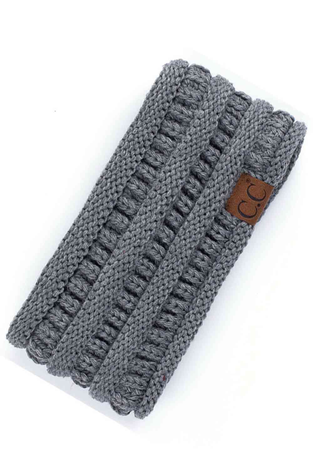 Light Grey Elevate your everyday style with the C.C Solid Ribbed Headwrap. Crafted from 100% acrylic, this versatile headwrap features a classic ribbed texture that adds dimension and visual interest. One size fits most, making it the perfect accessory for any occasion—whether you're running errands, hitting the gym, or making a fashion statement. Made in Korea with quality craftsmanship you can trust. Comfortable, durable, and effortlessly chic.