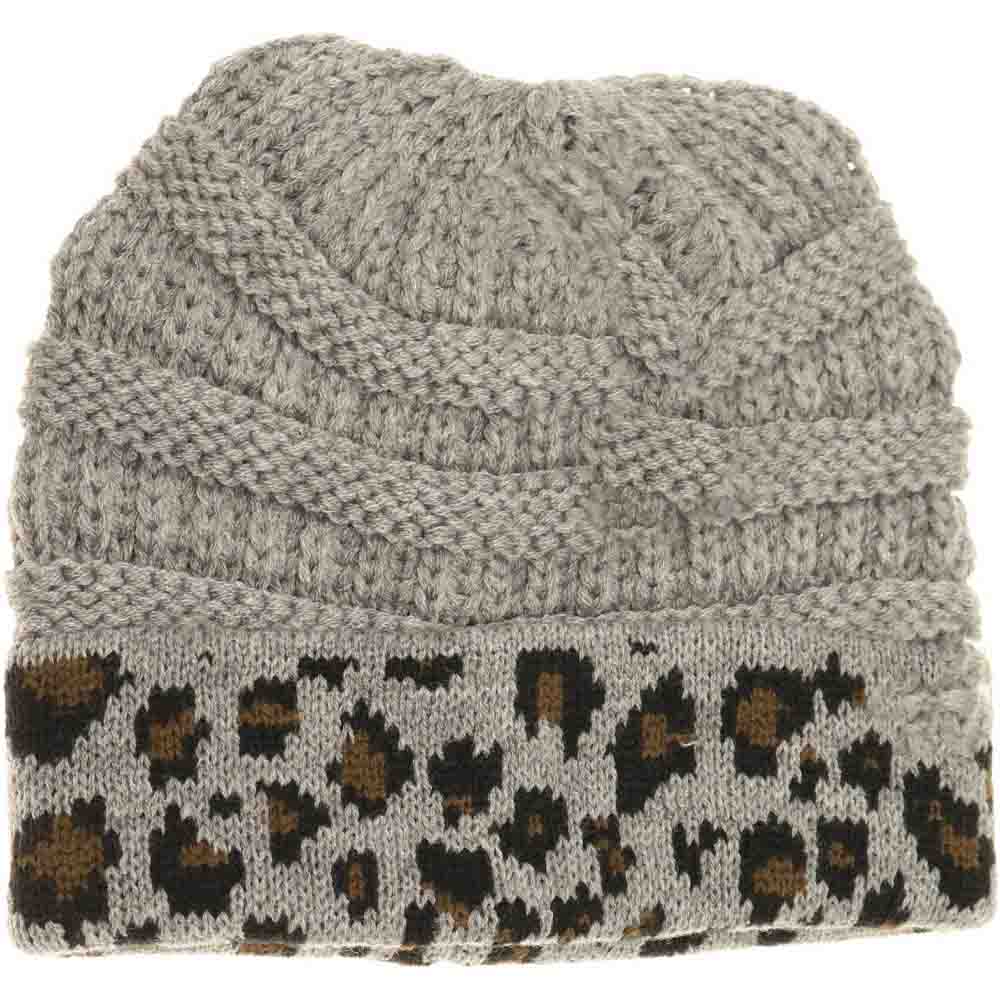 Lt-Grey Kids Matching Cuff Leopard Print CC Beanie combines playful style with cozy warmth. Crafted from a soft knit fabric, this piece features a trendy leopard print pattern and a folded cuff accented by the classic CC logo. Ideal for chilly days, it keeps little heads comfortable while adding a fashionable touch to any outfit. Perfect for matching with adult styles, this beanie offers both practicality and a chic edge for young fashion enthusiasts. 