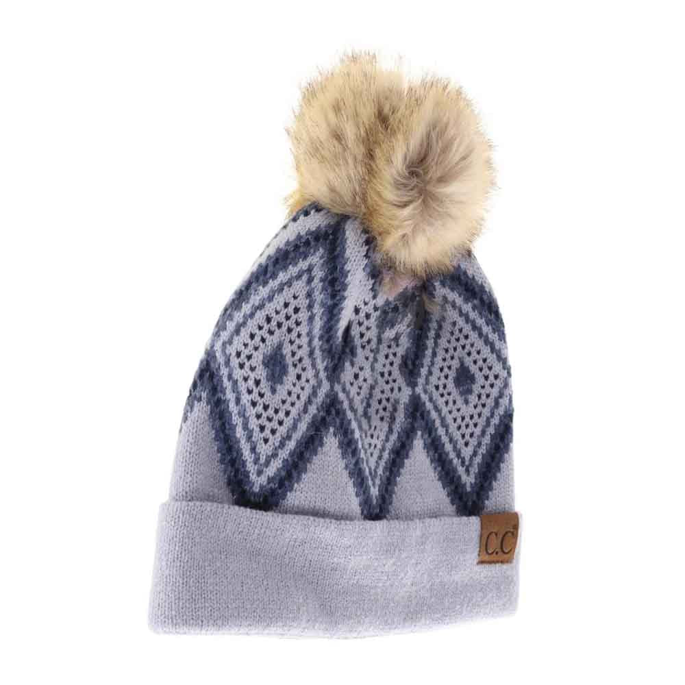 Lt.Blue Diamond Geometric Pattern Faux Fur Pom C.C Beanie combines stylish design with cozy warmth. Crafted with a soft faux fur pom-pom and featuring a distinctive diamond geometric pattern, it offers both fashion-forward appeal and comfort. Ideal for chilly days, this beanie provides a snug fit that helps retain heat while adding a sophisticated touch to your winter wardrobe. 