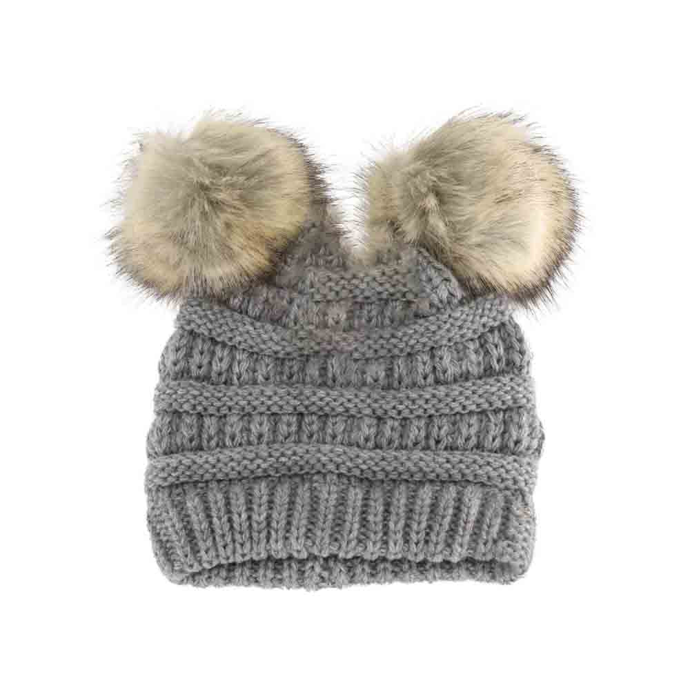 Lt.Grey BABY Solid Ribbed Faux Fur Double Pom C.C Beanie combines soft ribbed knit fabric with two plush faux fur pom-poms, delivering cozy warmth and playful style for little ones. Its stretchable design ensures a snug, comfortable fit, perfect for keeping babies warm during chilly days while adding an adorable touch to any outfit. Durable and easy to care for, this beanie is an expert choice for both function and fashion in children's cold-weather accessories. 